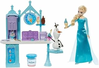 Mattel Disney Frozen Speelgoed, Toetjesspeelset met Elsa pop, Olaf figuur, 2 kleuren klei en meer dan 10 speelonderdelen, geïnspireerd op Disney Frozen films HMJ48